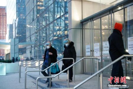 　资料图：疫情下的美国。 中新社记者 廖攀 摄